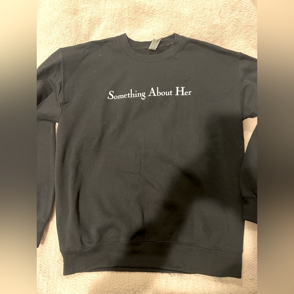 Something about her gildan sweatshirt.